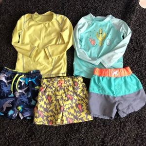 Bundle of swim trunks and shirts